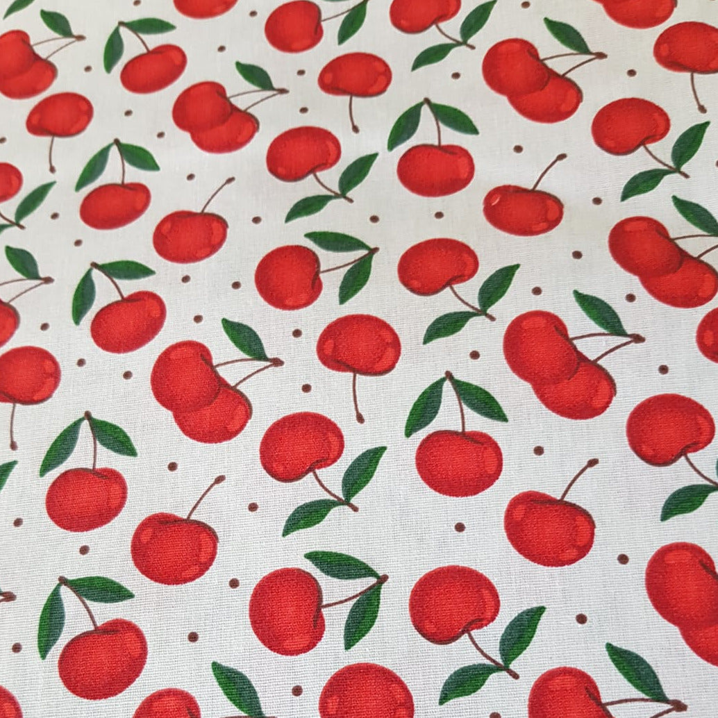 Frutales cerezas fondo beige