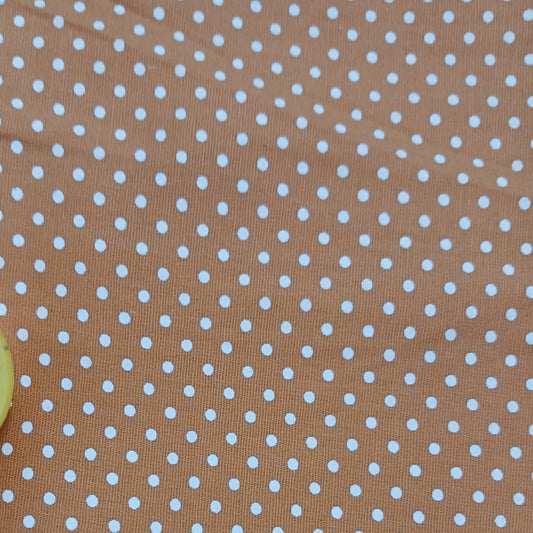 Motas blanco sobre naranja