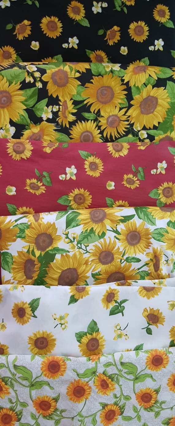 Girasoles flores pequeñas fondo bordó