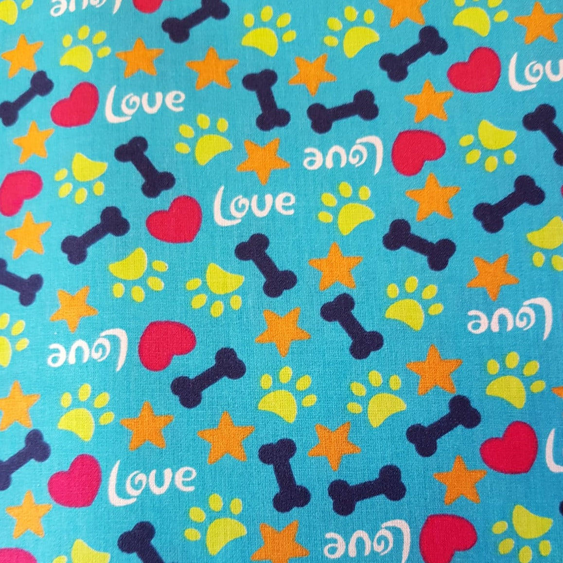 Love Pets huesitos fondo turquesa perritos