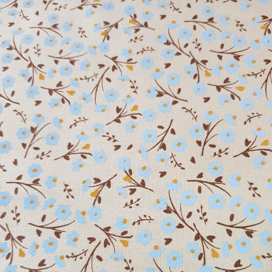 Florcitas manzanilla fondo beige
