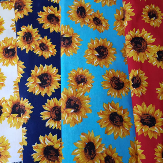 Girasoles sueltos fondo azul