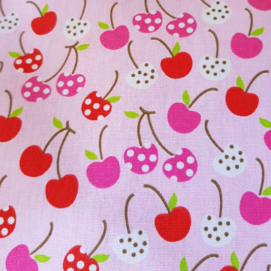 Frutales cerezas fondo rosa