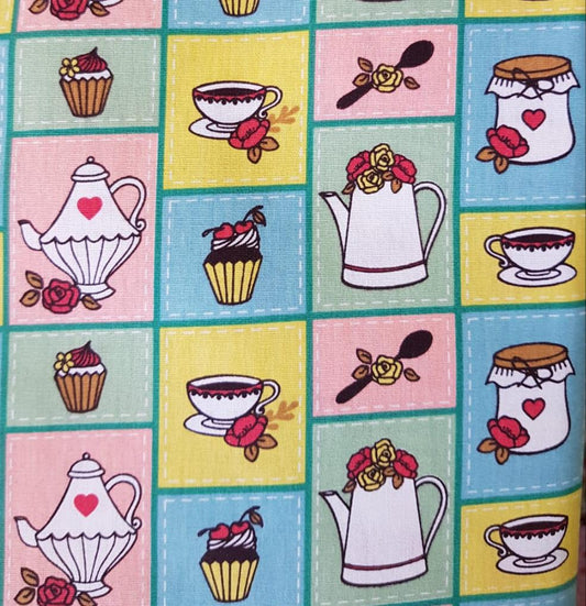 Dulces, tetera y cafe en cuadros