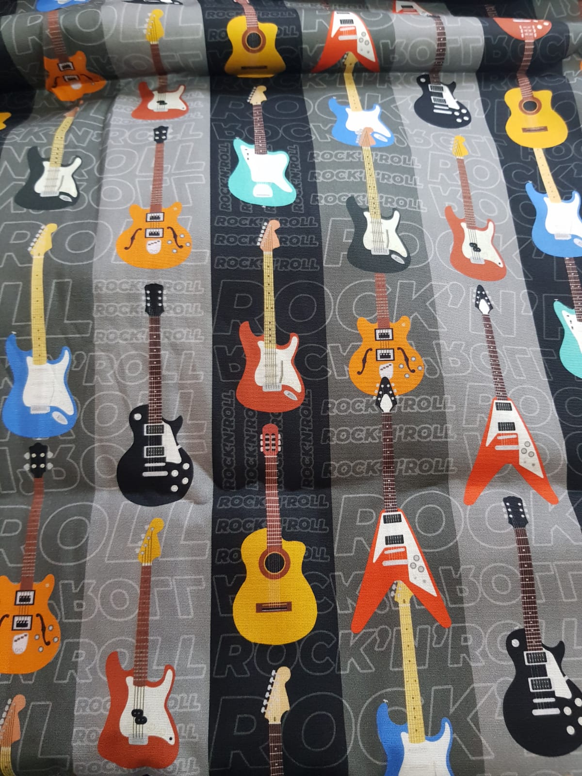 Guitarra electrica fondo gris