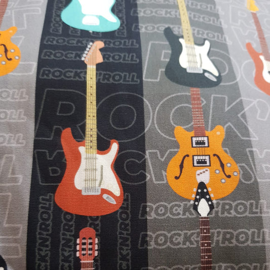 Guitarra electrica fondo gris